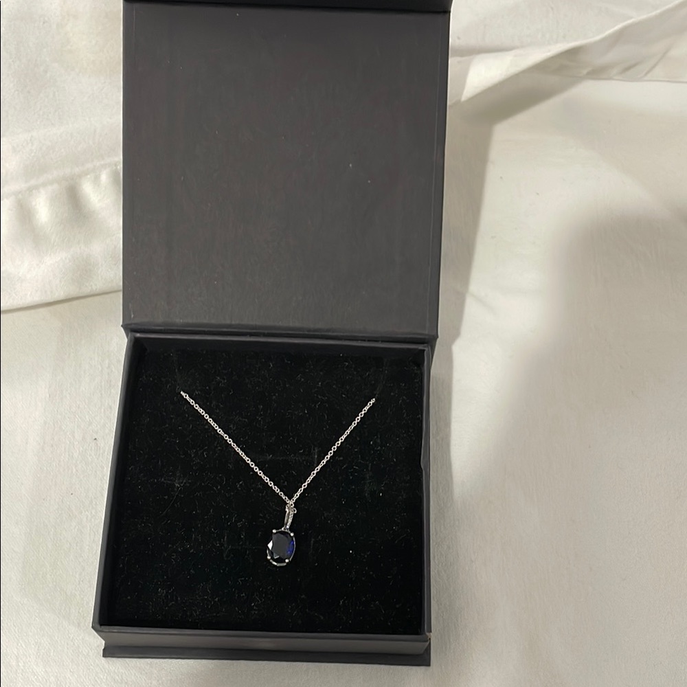 Elegant Silver Necklace with Blue Pendant